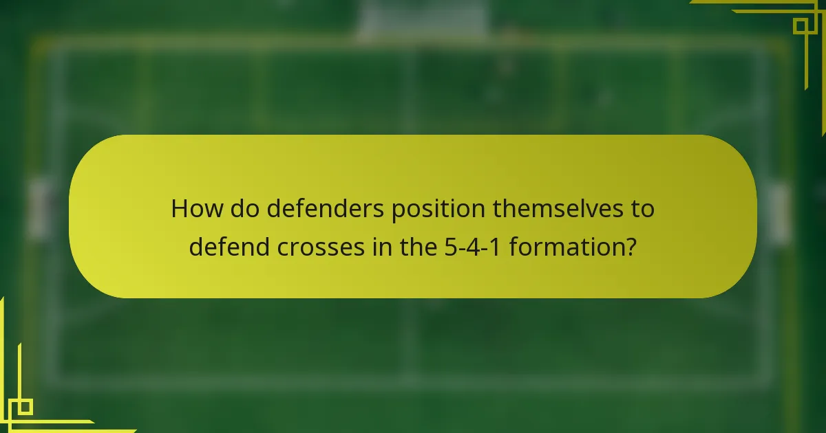 How do defenders position themselves to defend crosses in the 5-4-1 formation?